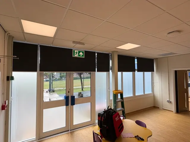 Roller blinds in a commercial setting — genuine completed work by Gemini Blinds